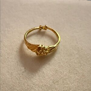 NWT Elegant Gold Floral Ring 3.25-4.25” stretches if needed. Great first ring!